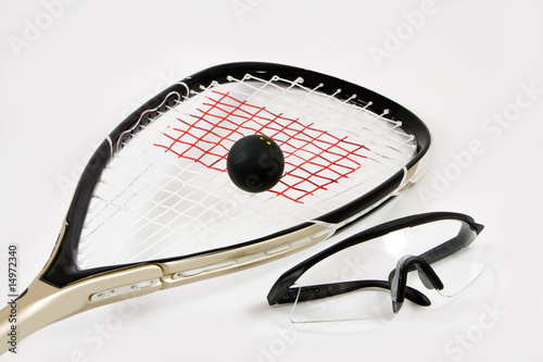 Squash racquet, ball and safety glasses