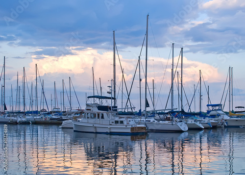 Boats and yachts moored in harbour