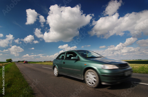 Road, car, blue cloudy sky