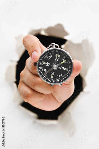 Hand breakthrough wall holding compass