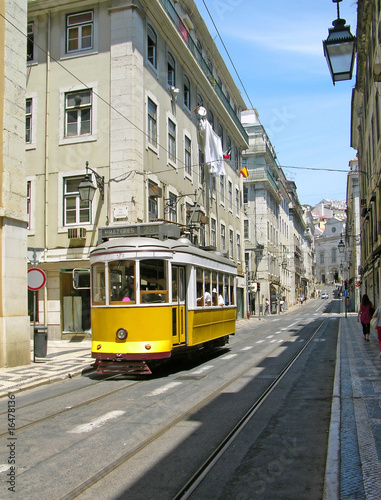 Old yellow tram in Lisbon downtown, Portugal