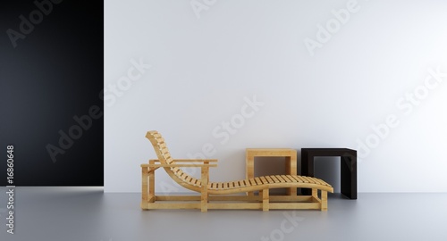 sunlounger and racks to face a blank white wall