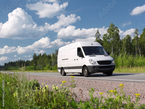 white van on rural highway, landscape