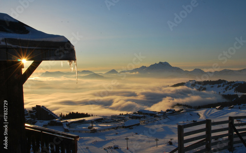 View of Avoriaz sunset over mist in valley