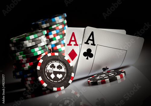 gambling chips and aces