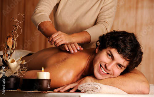 handsome happy young man on massage