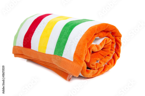 Striped beach towel on white