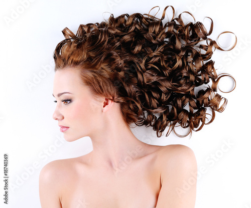 woman with beautiful long curly hairs