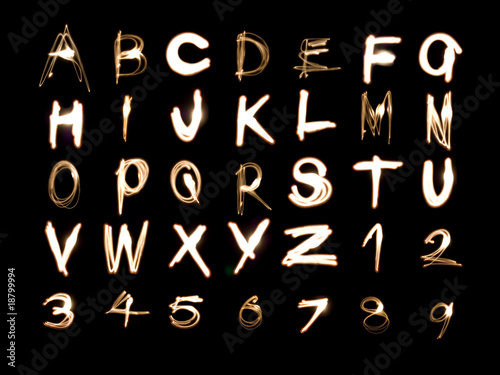 Light painting illustration of the alphabet and numbers 1 to 9