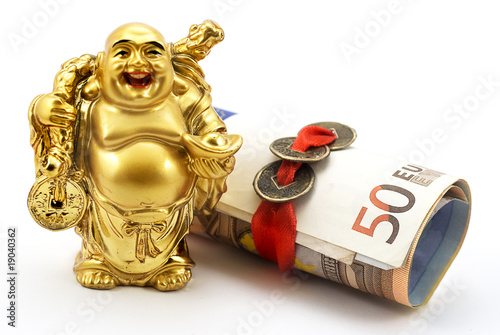 Gold laughing Buddha with money and chinese coins