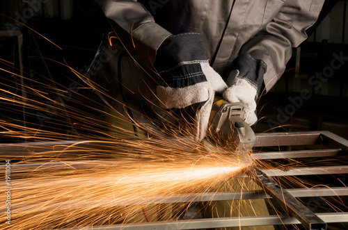 close up of a worker grinding