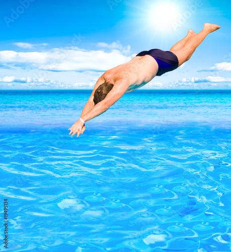 man swimming in a blue pool man summer sport