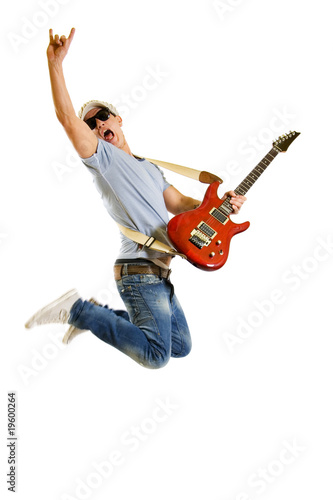 Passionate guitarist jumps isolated on white