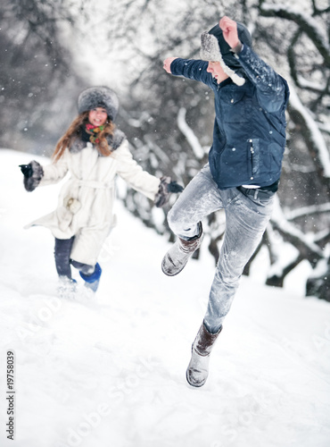 Young couple playing outdoors