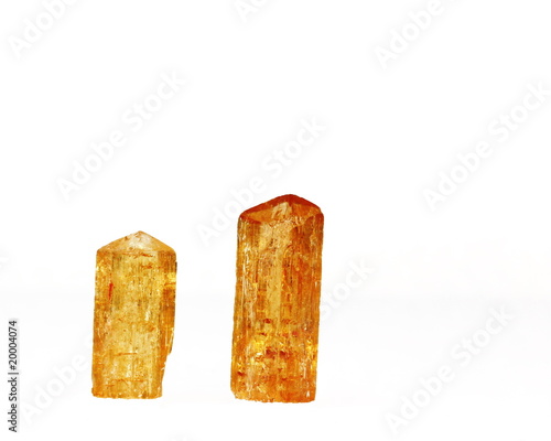 Two orange Imperial Topaz crystals, birthstone for November
