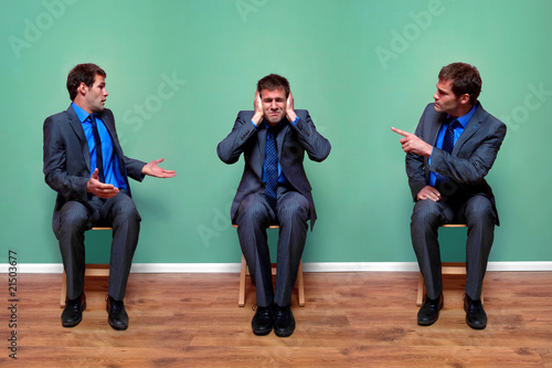 Businessman arguing with himself