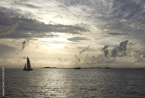 sailboats at golden sunset