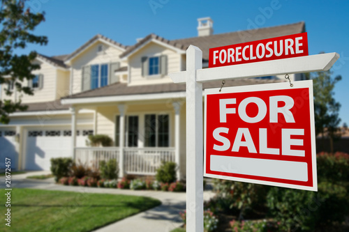 Foreclosure Real Estate Sign and House