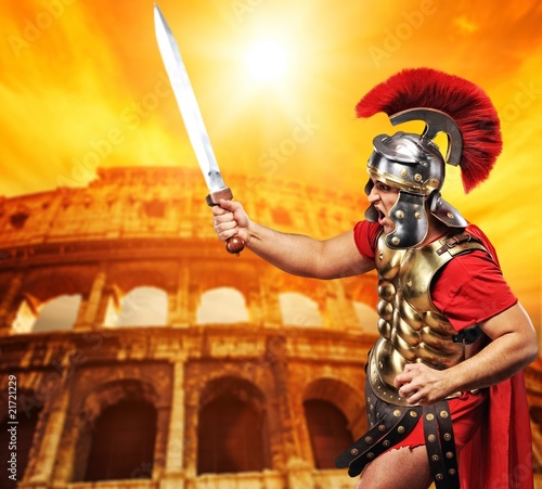 Roman legionary soldier in front of coliseum