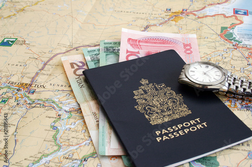 Passport , lots of money , steel watch, and a map.