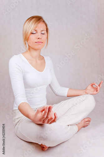 young woman relaxing - on white background