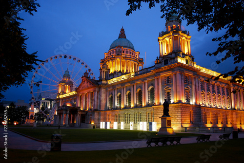 Belfast City Hall and Belfast Eye at dusk.
