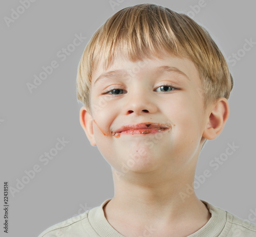 cute boy with chocolate face