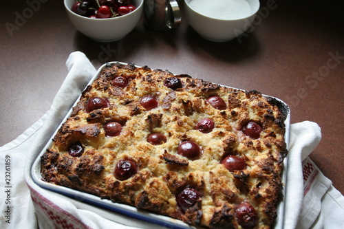 Soufflé with bread and cherries, baked pastries