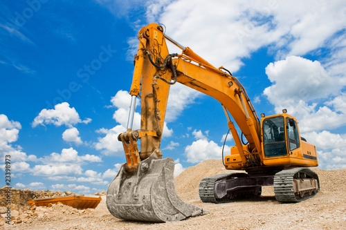 Yellow Excavator at Construction Site