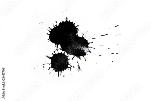 black ink blot on white background