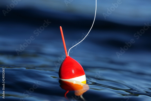 Cork Floating on Calm Lake