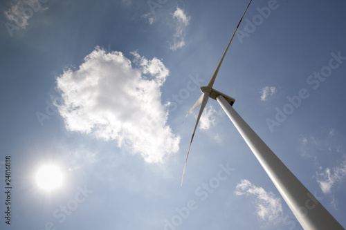 windpower with sun and blue sky