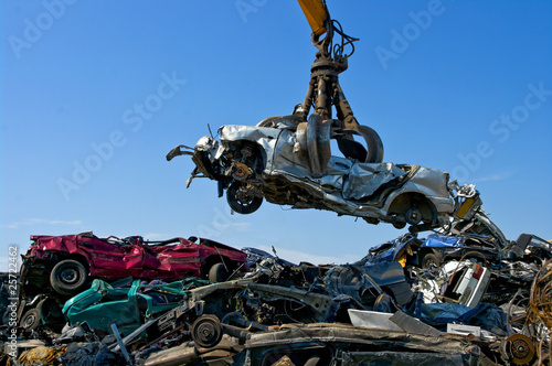 Junkyard picking up car