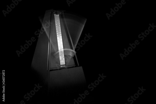 Metronome Ticking with Black Background