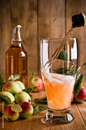 Pouring Glass of Cider