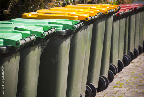 Wheelie bins for garbage collection and recycling in a row