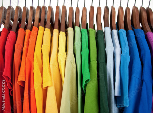 Colors of rainbow, clothes on wooden hangers