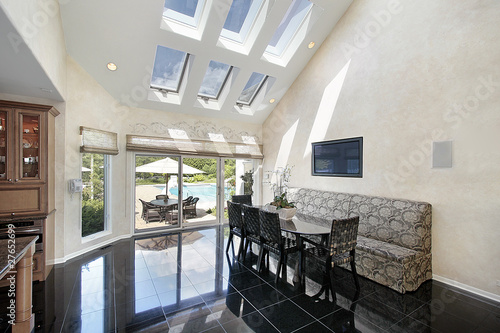 Sitting area with skylights and pool view