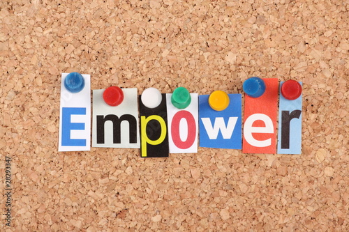 The word Empower in magazine letters on a notice board