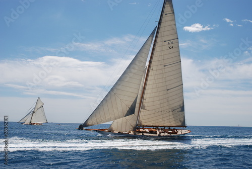 Classic wood Yacht under full sail