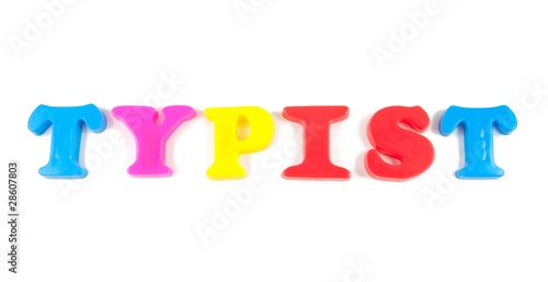 typist written in fridge magnets on white background