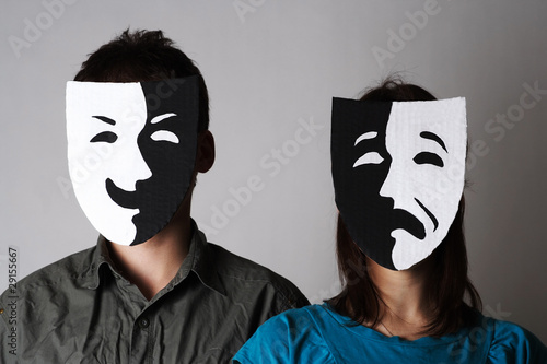 man and woman in theater black and white emotions masks