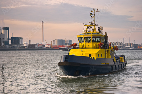 Tug on the river at sunrise