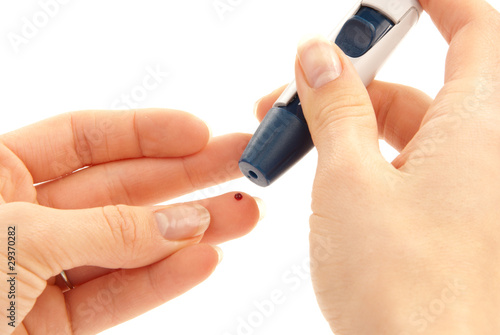 Lancet in hand prick finger for blood glucose level