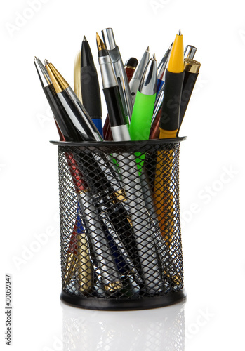 colorful pens in holder isolated on white