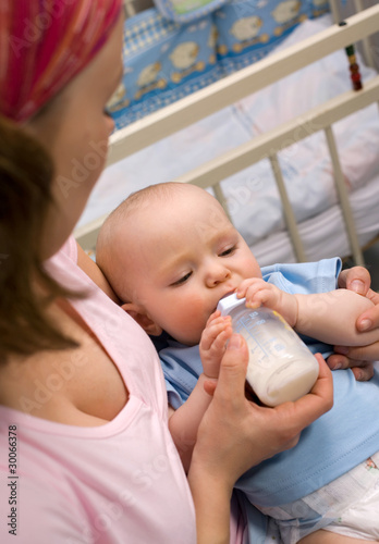 mother feeding baby