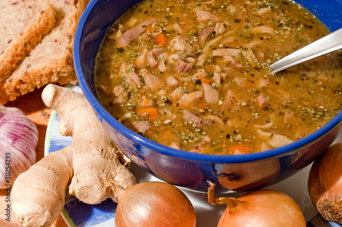 Traditional tripe soup in blue pottery