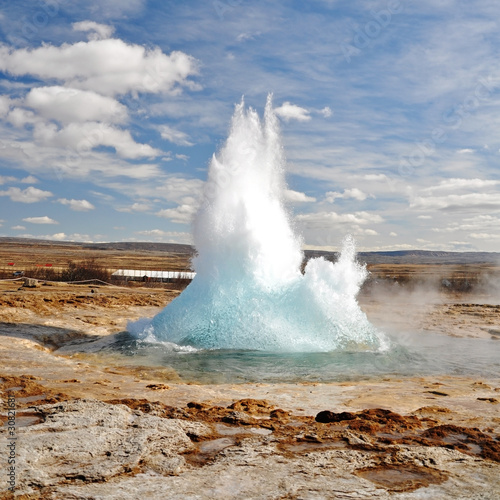 Famous Geyser eruption in a sunny day, Iceland