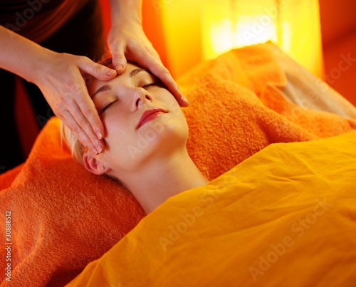 Beautiful woman having a face massage