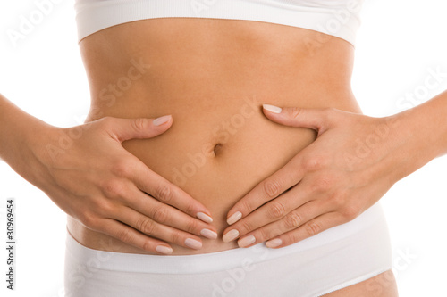 Woman's hands on stomach